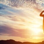 Soldier saluting at sunset_s